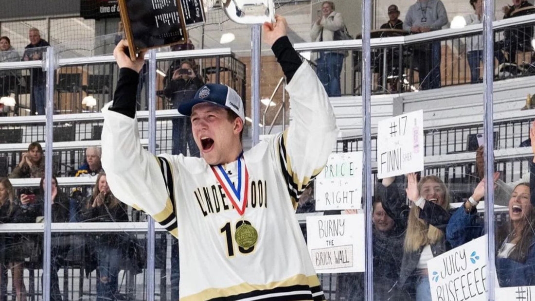 Caige celebrating national hockey championship win Lindenwood